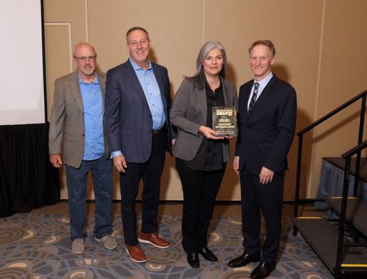 L-R: John Beyer, Global Process Engineering Leader, Creation Technologies; Todd Baggett, Chief Commercial Officer, Creation Technologies; Diana Ferrari, Senior Vice President, Customer Engineering Solutions, Creation Technologies; Mike Buetow, President, Printed Circuit Engineering Association